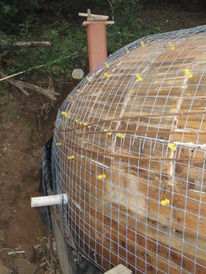 hobbit house construction formwork concrete dome vent pipe